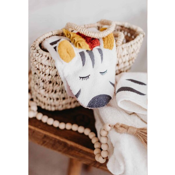 Kikadu Waschlappen Zebra in einem Korb liegend