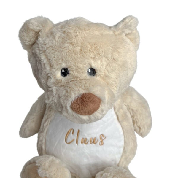 Personalisiertes Kuscheltier Teddy mit Blick auf das Köpfchen